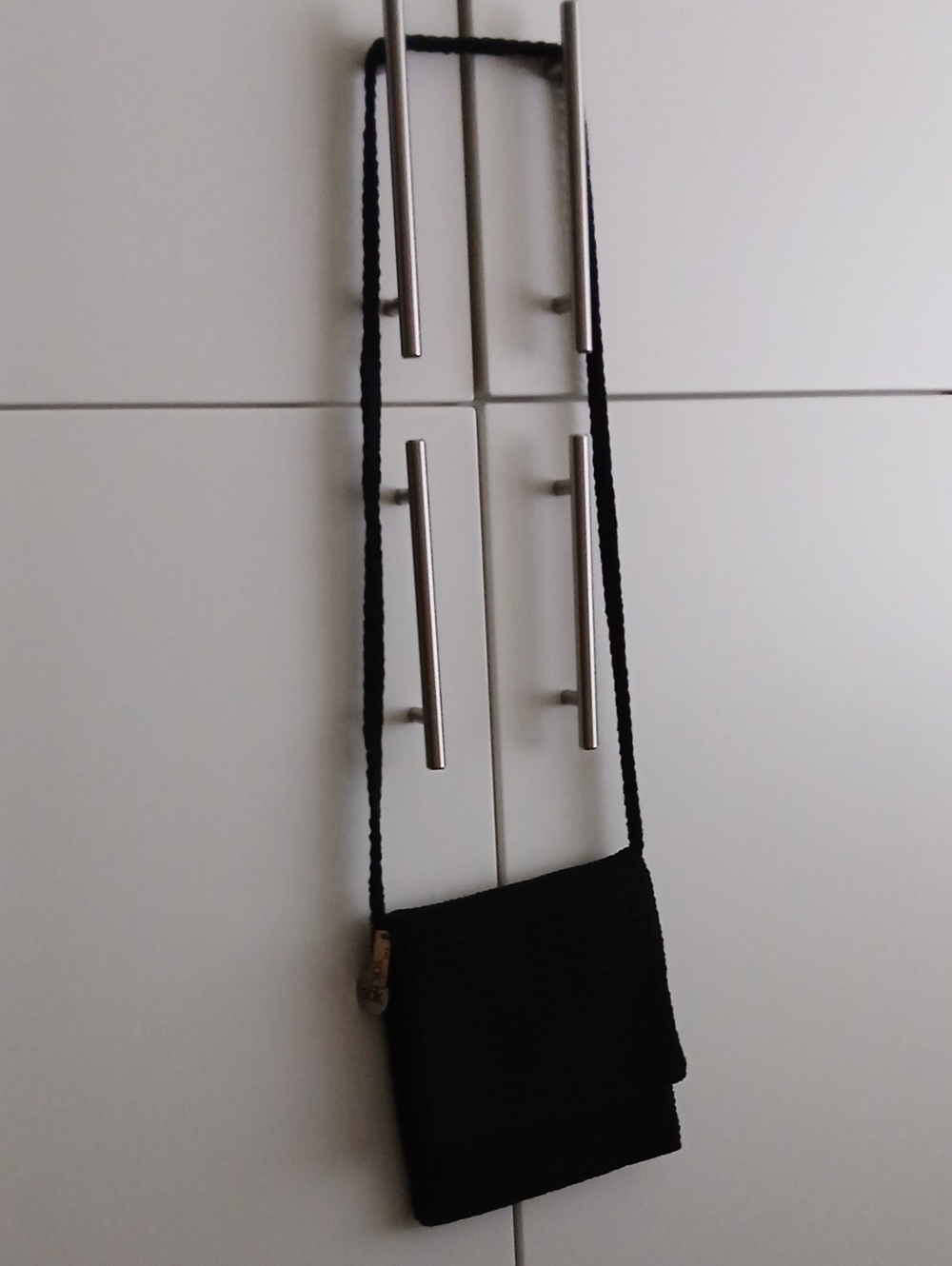 The Sak Black Woven-Flap Crossbody with Braided Strap